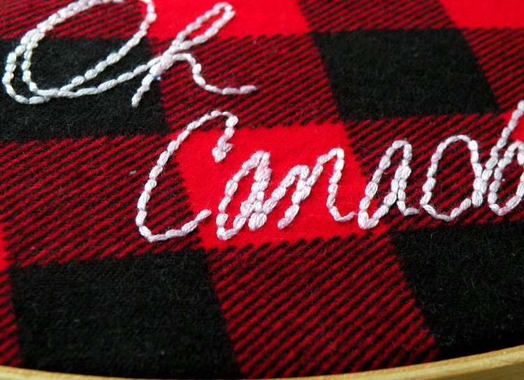 Oh Canada embroidered red and black flannel wooden hoop wall hanging 5x9 oval