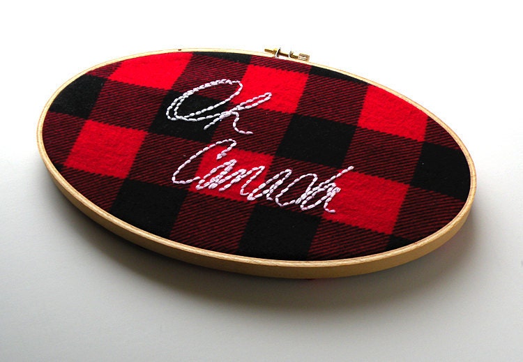 Oh Canada embroidered red and black flannel wooden hoop wall hanging 5x9 oval