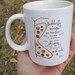 MUG titled butterfly wings. by rachel awes.