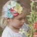 Easter Whim- aqua, pink, peach, coral and yellow rosette and flower collage headband with feather