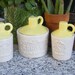 Salt & Pepper Shakers and Grease Jar in Yellow