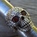 Sale....Sugar skull ring in sterling silver with blood red cz's for eyes