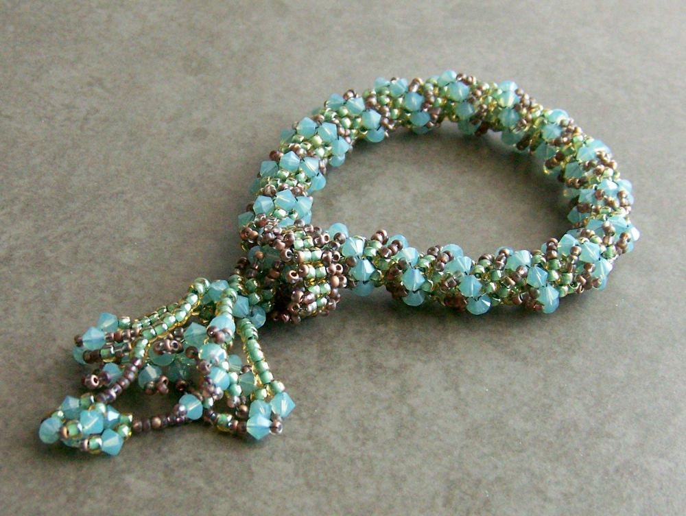Bracelet. Dutch Tassel, Handwoven. Opal Blue, Green, Copper Brown.