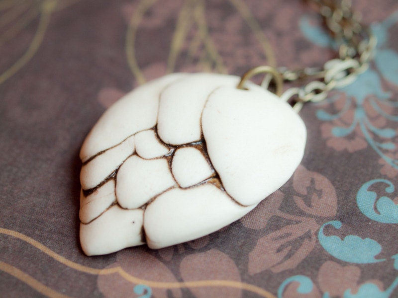 Petals porcelain pendant. Floral cream necklace with deep brown accents.