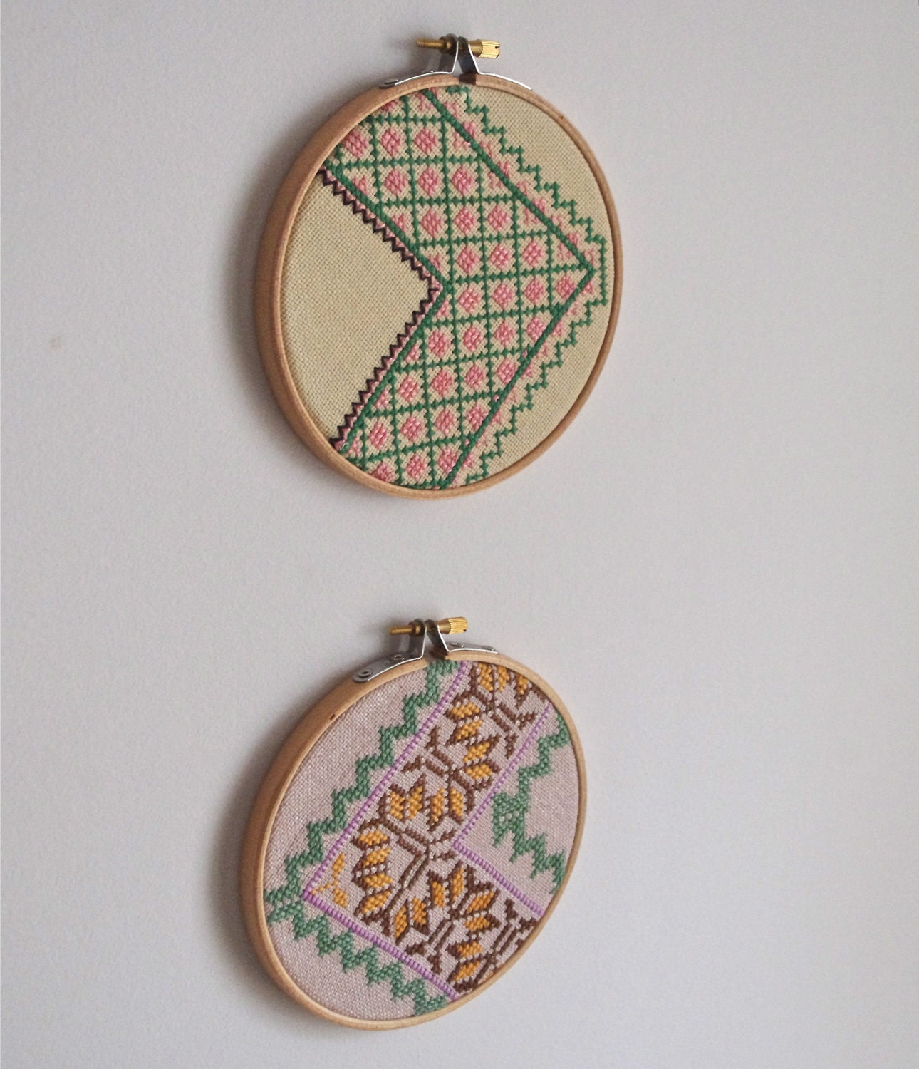 Pair of vintage embroidered zig zag wall art hoops