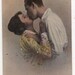 Vintage, colour photographic postcard showing a woman kissing a handsome devil, with added glitter