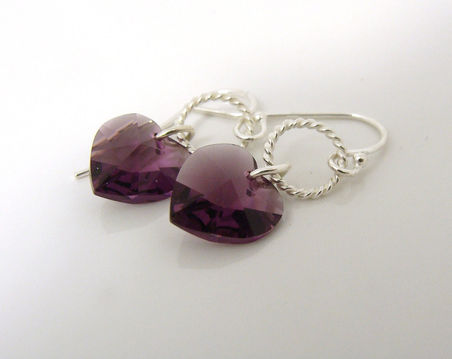 Purple Swarovski crystal heart earrings with sterling silver twisted rings