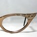 Curvy Cat Eye Glasses with Rhinestones and Etched Designs.