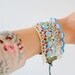 robin eggs.. handmade Vintage lace bracelet with blue beads,ribbon and more