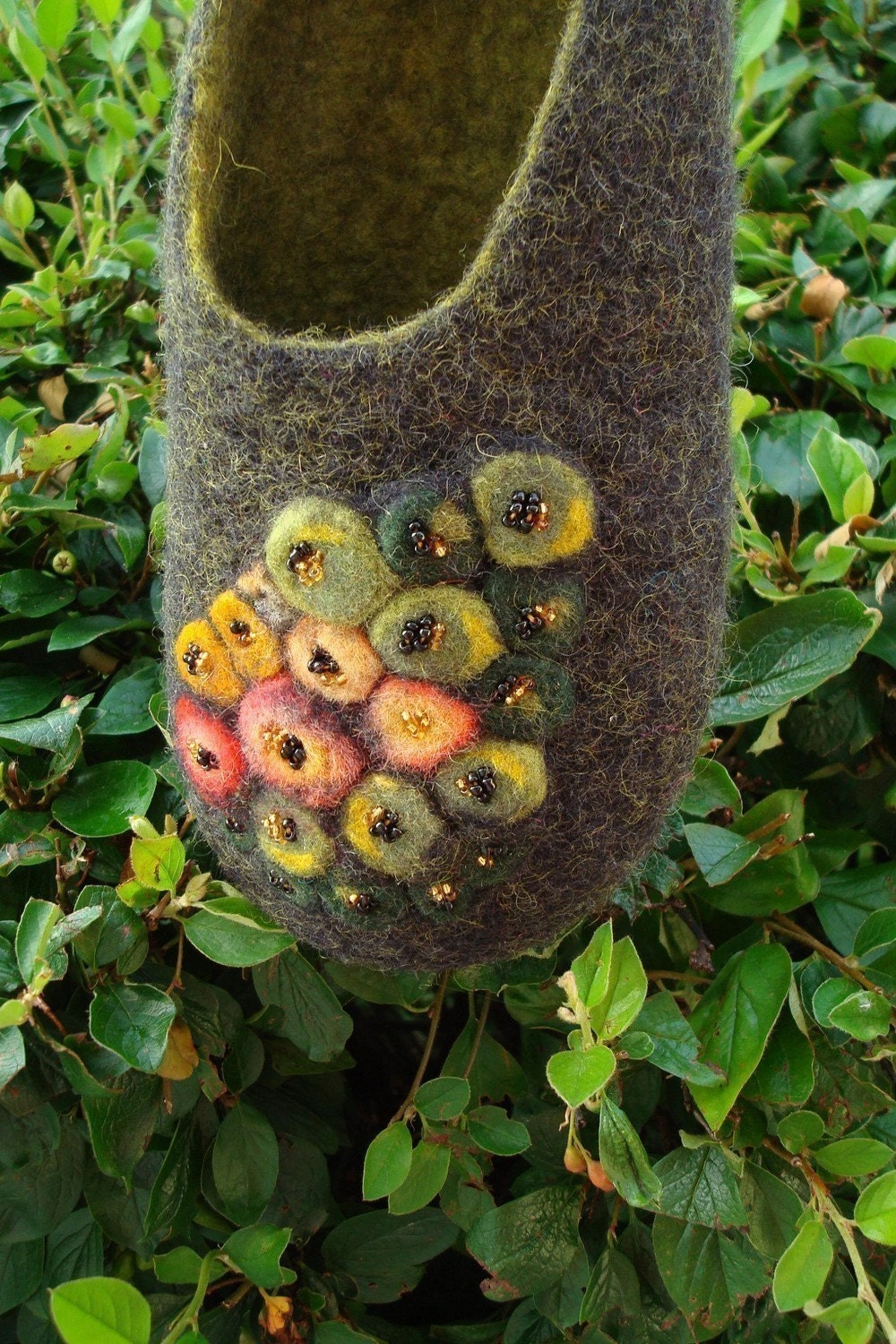 Felted black/green wool slippers with colorful decoration