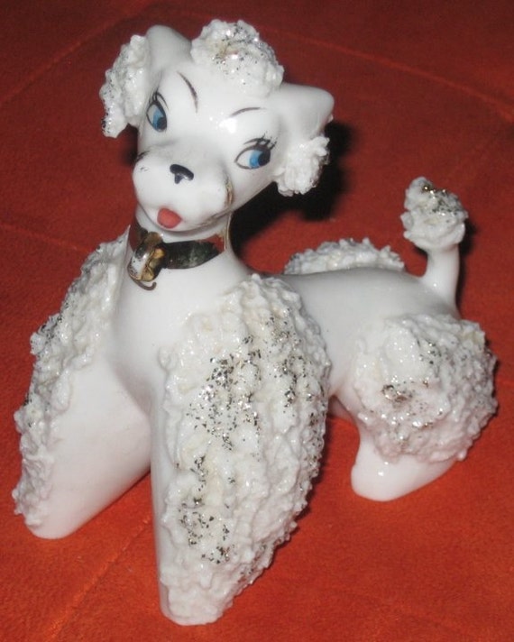 white ceramic poodle