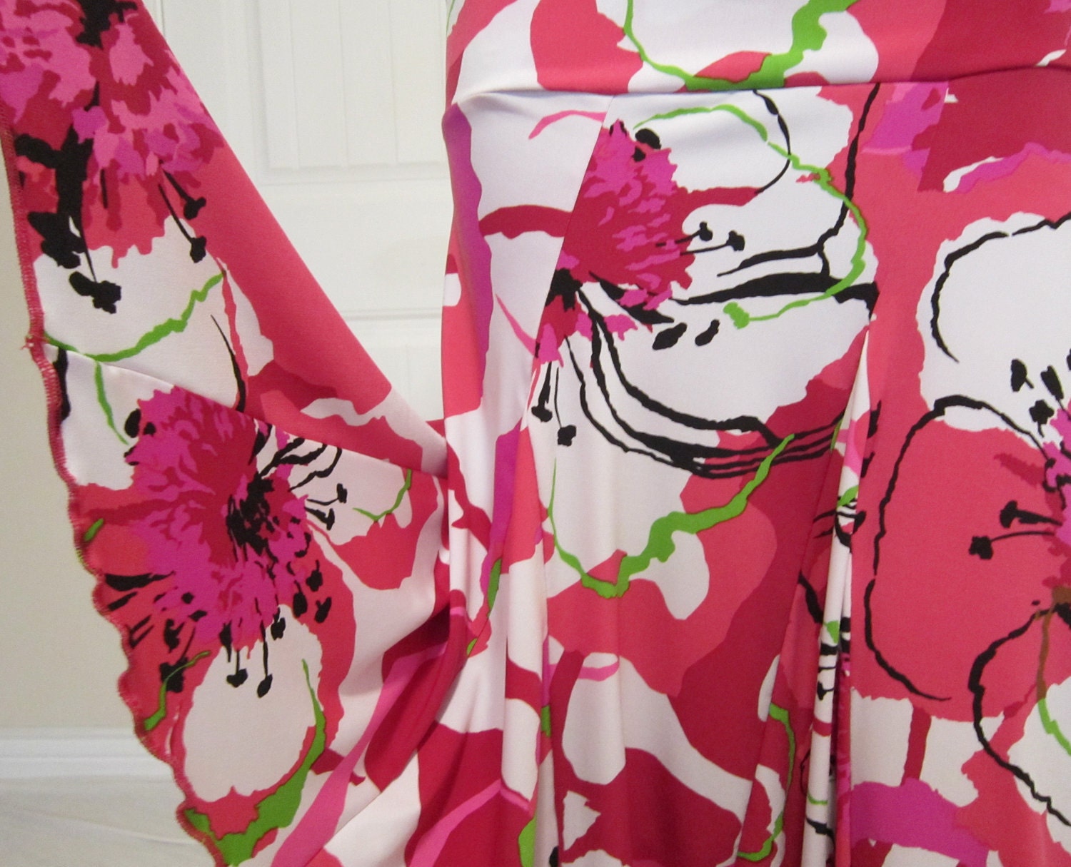 Ladies Modest Knit Dance Skirt with handkerchief hemline with bright floral pink  on a white background, size s/m