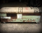 Salvaged wood and recycled coffee sack storage bench w/ industrial casters