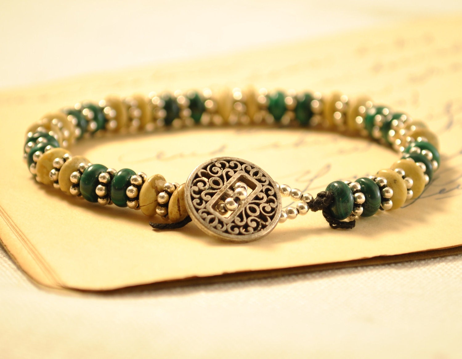 Silver and Green Beaded Bracelet on Irish Linen Featuring a button clasp