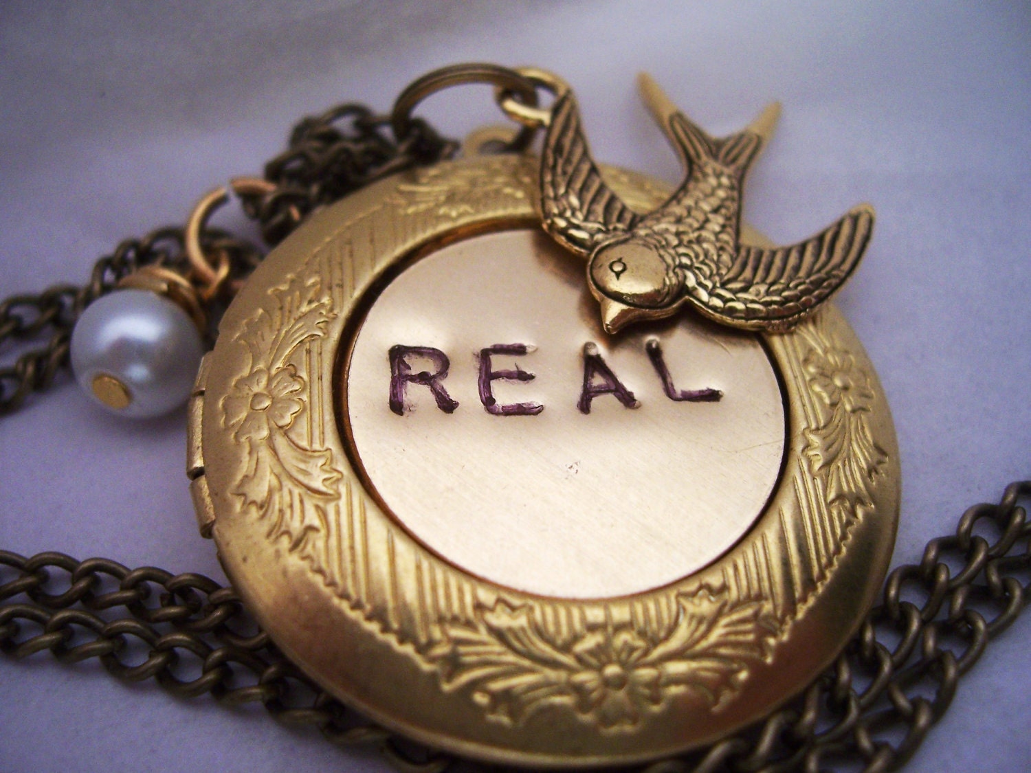 Hunger Games Necklace - Peeta's locket  with  Mockingjay -pearl and coal