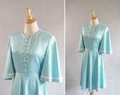 Vintage 1960s mini dress baby blue bell sleeves with front buttons Mary quaint style vintage vogue pattern design with vogue label