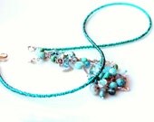 asymmetric teal necklace. turquoise adjustable beaded choker fringe with silver mini charms. wire wrapped jewelry by uniquenecks