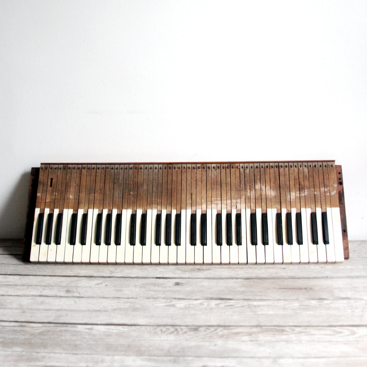 antique late 1800s wooden organ keyboard