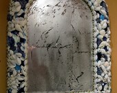 Vintage silverleafed seashell mirror