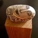 hand painted, hand gilded beach stone ORIGINAL