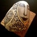 hand painted, hand gilded beach stone ORIGINAL