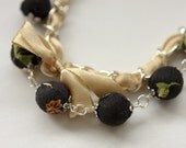 Black floral beads and ivory ribbon bracelet