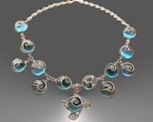 Blue woven snails necklace