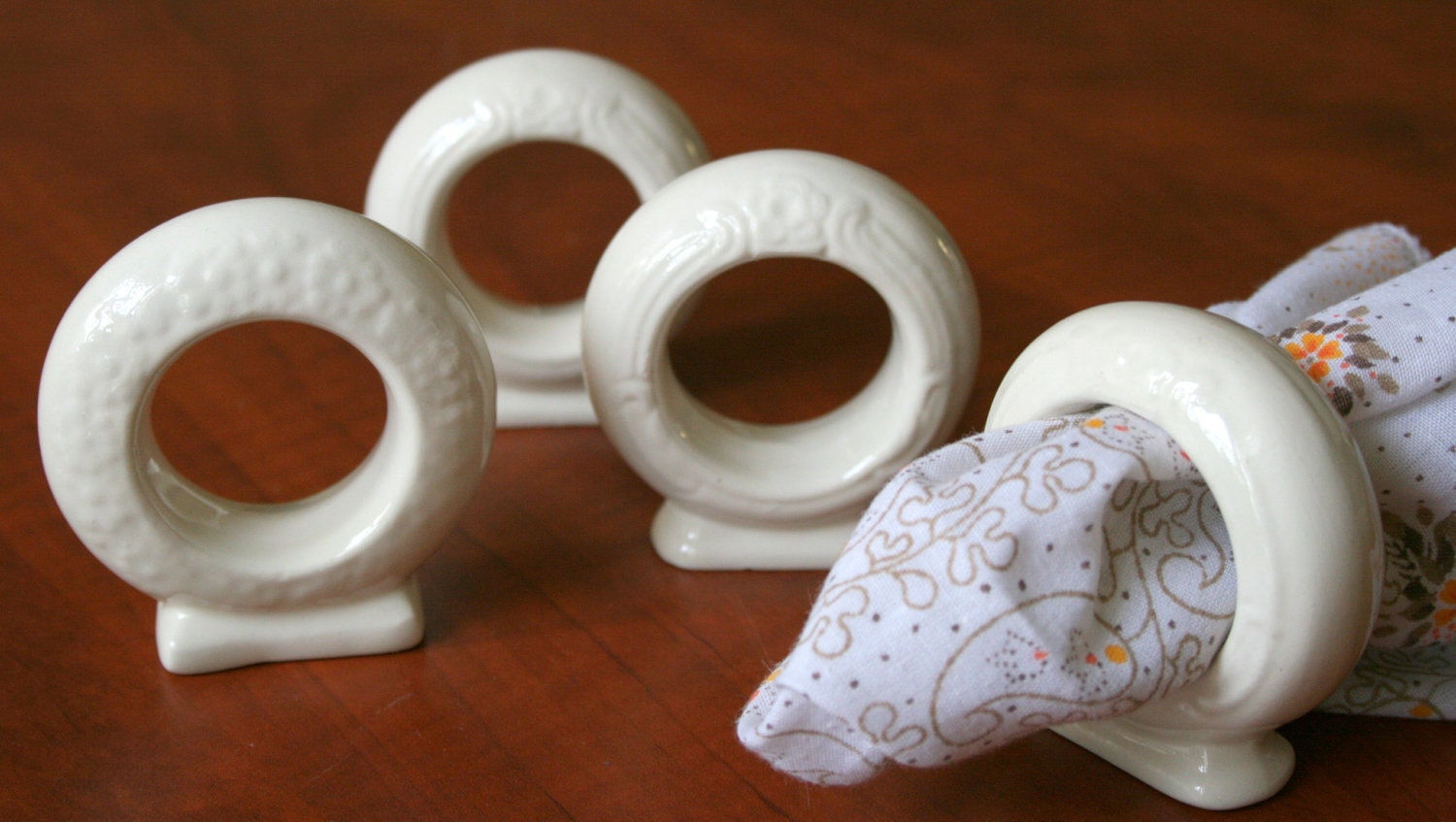Off White Floral Embossed Ironstone Napkin Rings Set of Four 1930s
