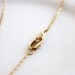 Tiny Gold Skull Necklace