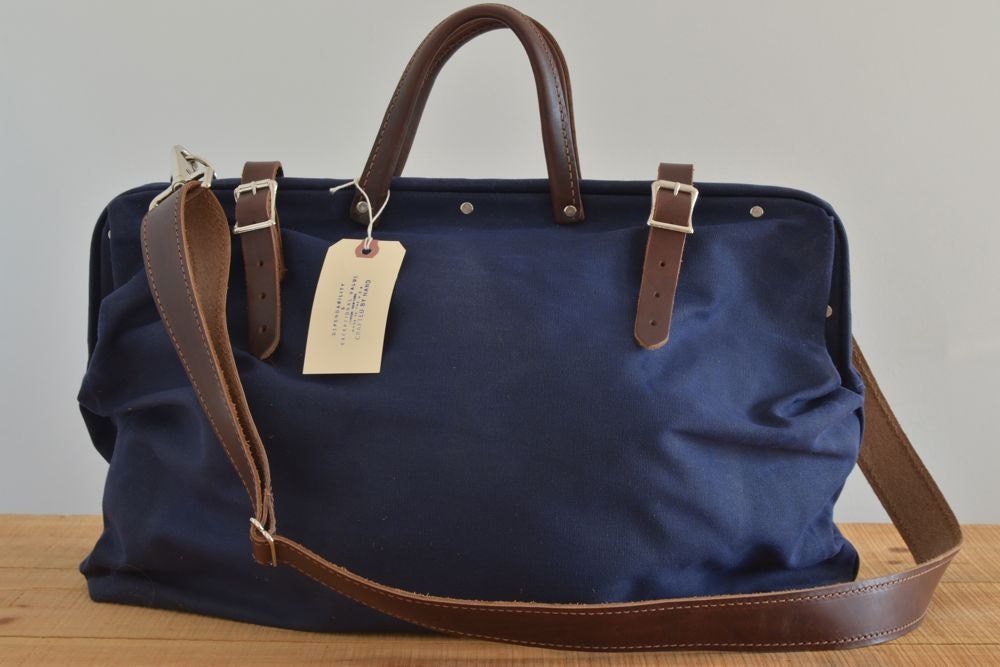 Harry navy waxed canvas bag with detachable leather strap