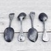 Vintage Metal Spoons: Four French tin spoons