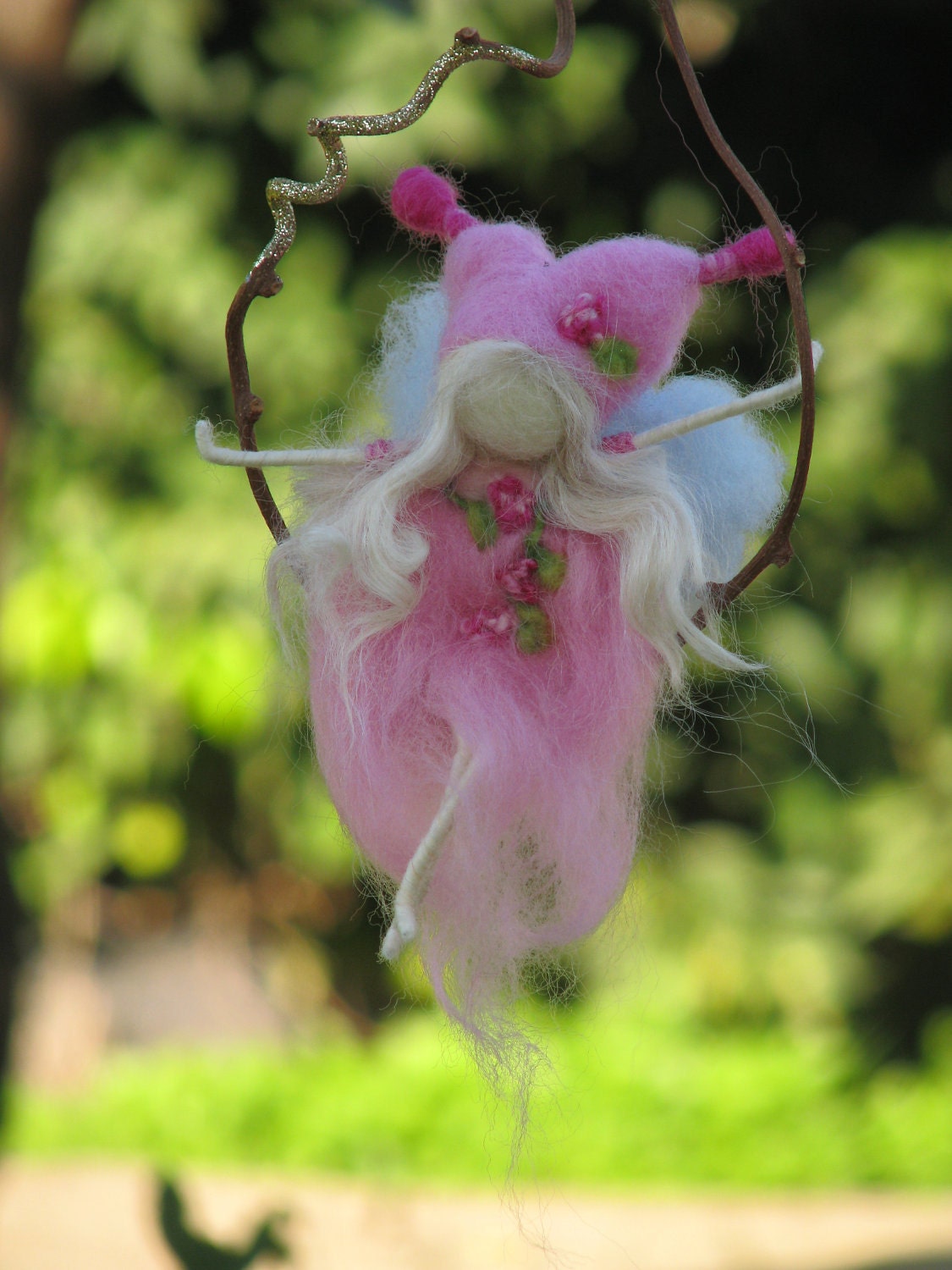 Needle felted fairy sitting on a twig, waldorf inspired