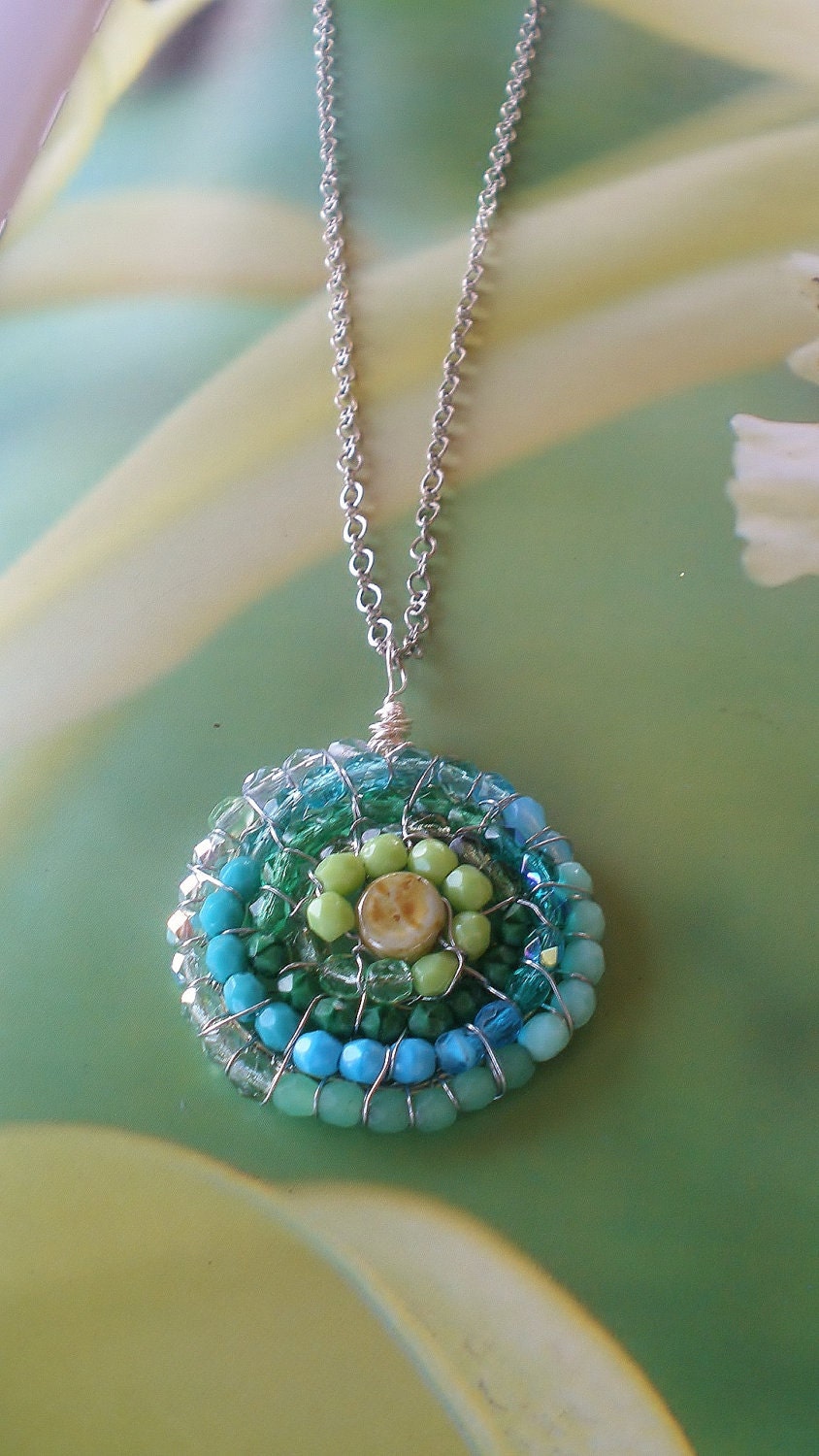 Wire wrapped pendant  Blue, Turquoise, Aqua and Green glass beads on silver wire