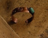 Copper cuff bracelet.