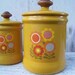 Retro 1970s harvest gold, flowered tin canister set made by Westbend, made in USA on Etsy