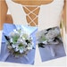 White Lily Wedding Bouquet and Boutonniere