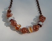 Creme brule glass and twisted copper necklace