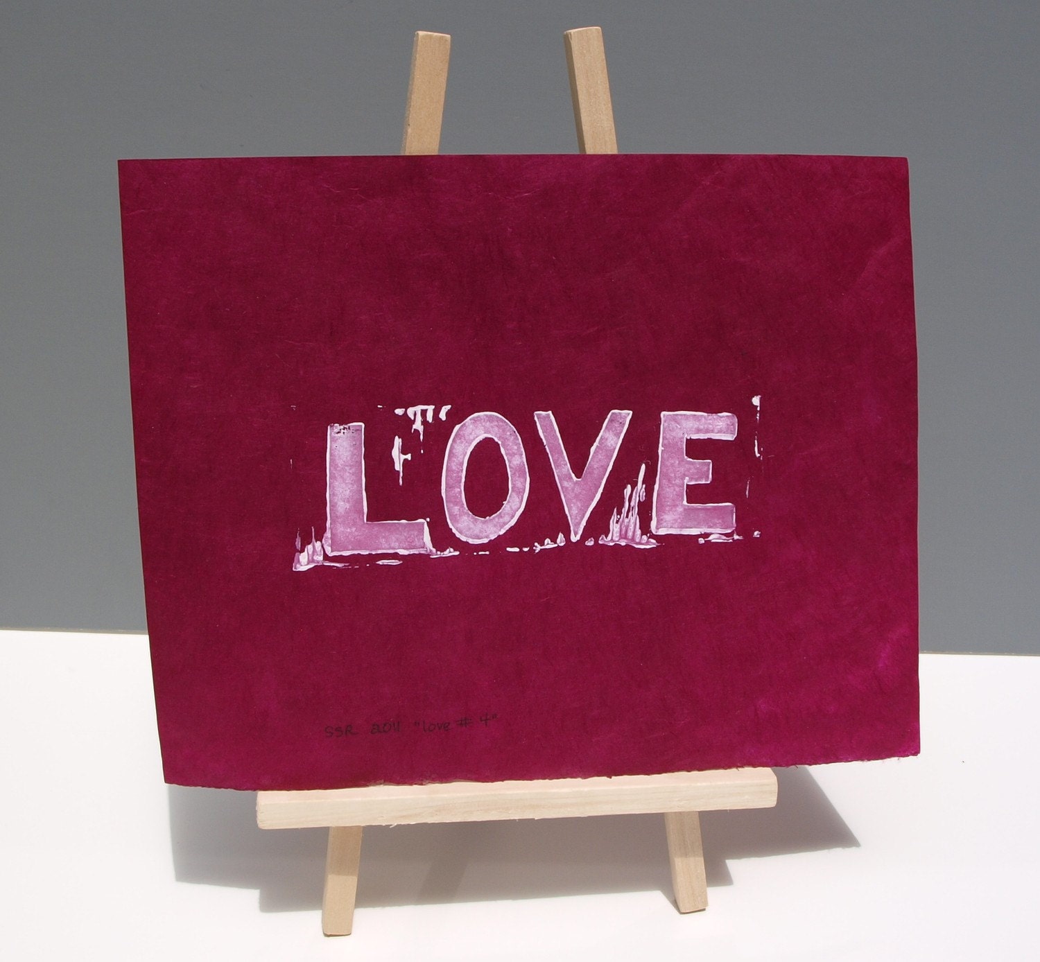 LOVE art Typography Linocut PRINT - LOVE in White on Raspberry Lama Li Paper 8x10
