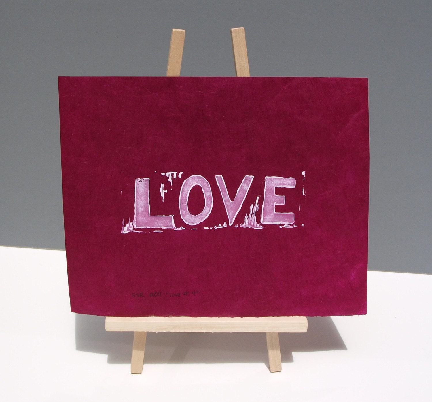 LOVE art Typography Linocut PRINT - LOVE in White on Raspberry Lama Li Paper 8x10