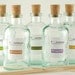 Reed Diffuser -Choice of 5 scents - Eucalyptus, Grapefruit, Pomegranate, Lavender, Orange, 8 oz clear apothecary glass jar w/ natural reeds