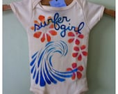 surfer girl with plumeria and wave, organic hand painted onesie or tee, personalizable