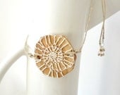 natural crochet fossil amulet necklace - cotton spiral on juniper wood slab - hemp cord - puka shell and silver detail