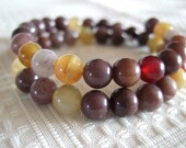 A Little Jade -round purple jade and natural stone beaded bracelet