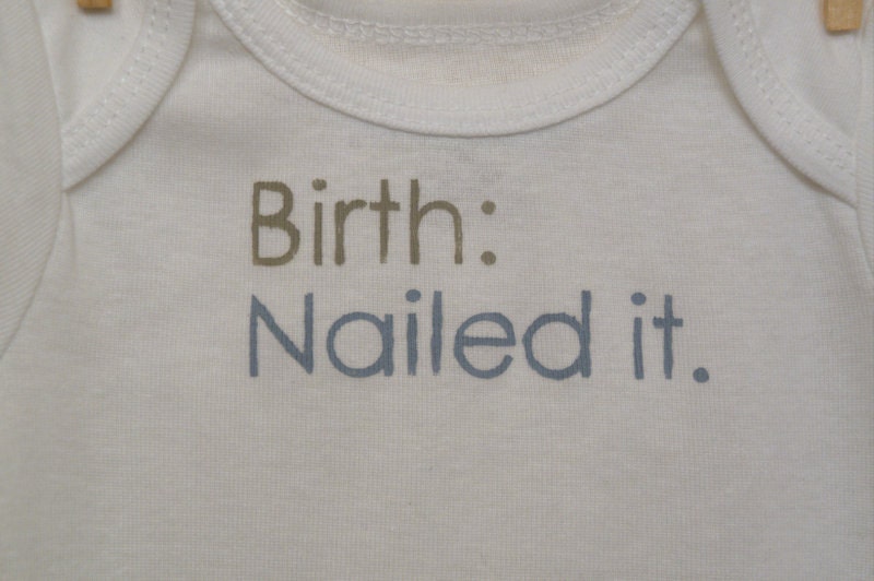 birth: nailed it --- white onesie, size 0-3 months --- blue