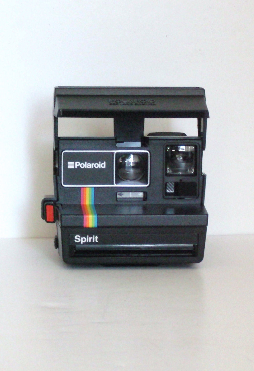 Polaroid Spirit 600 Land Camera - rare - 1980s - rainbow stripe on black with strap
