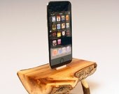 iPhone dock. iPod docking station. Table top memories of sitting around the camp fire making s'mores on a warm summer evening.