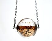 Copper glitter necklace in round hand blown glass necklace