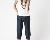 Green Charlie Pants - Silk three-quarter capri pants with front pleats and cute cuff