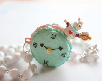 Alice in Wonderland Rabbit sitting on a macaroon necklace