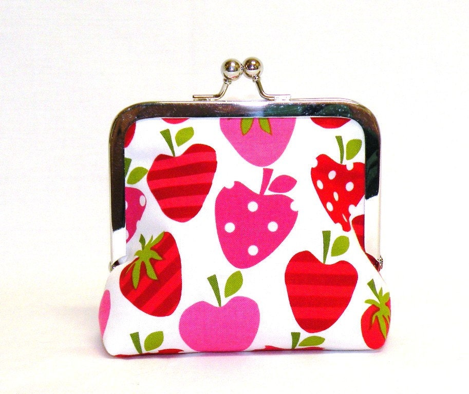 Ripe Strawberries Palm Clutch in a cheery strawberry print in shades of pink and red on white background